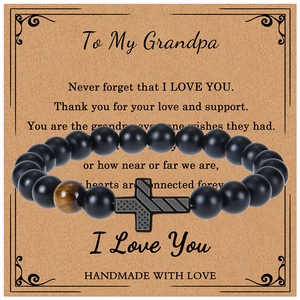Detail of cross bead bracelet with tiger eye stone and gift card for grandfather