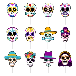 Set of 12 Day of the Dead cake toppers with colorful sugar skull designs for party decor