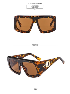 Detail view of leopard print square sunglasses with golden metal temple ornaments