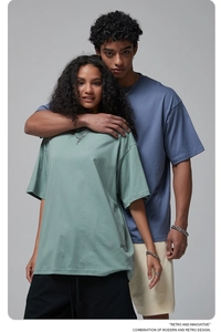Oversized 190g cotton T-shirts in light green and blue with a loose drop shoulder fit