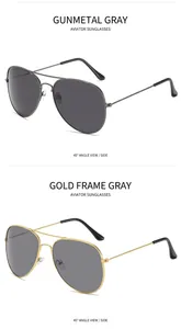 Classic aviator sunglasses in gunmetal and gold frames with dark grey lenses shown in detail