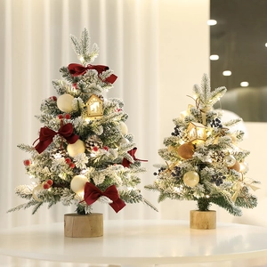 Mini tabletop flocked Christmas tree set with warm LED lights and festive ornaments
