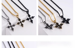 Detailed relief work on vintage vajra pendants in silver, gold, and black steel finishes
