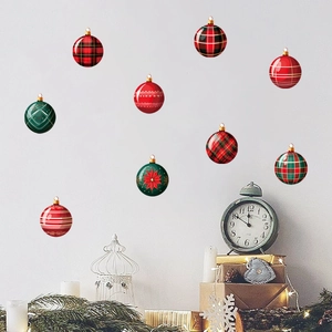 Set of 8 Christmas ornament wall decals with festive patterns on light gray wall