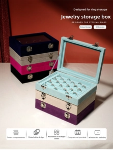 Close-up of velvet jewelry organizer box with clear window and metal buckles