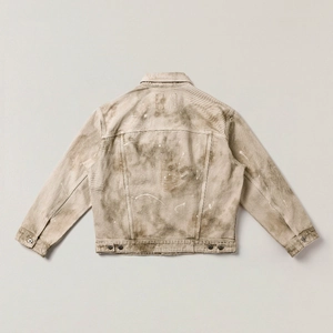 Detailed back view of khaki oversized denim jacket with white paint splatter and metal buttons
