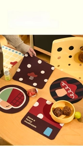 Close-up of mushroom patterned diatom mud heat resistant table mats in various shapes