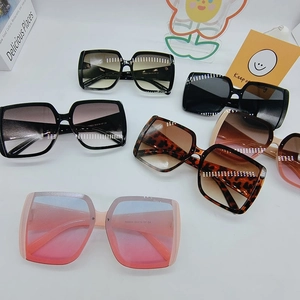 Detail view of large square sunglasses showing various colors and frame measurements