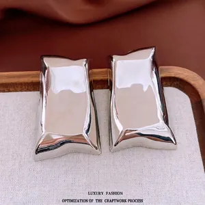 Polished silver liquid metal geometric rectangle drop earrings for women with mirror finish