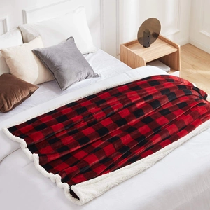 Double-layer flannel blanket with red and black checkered pattern and white sherpa lining