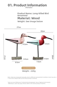 Detailed view of hand-painted wooden long-billed bird statues with metal stands and wood base
