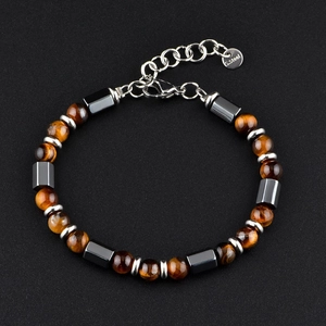 Bracelet en perles d'œil de tigre et hématite avec fermoir en acier inoxydable sur fond noir