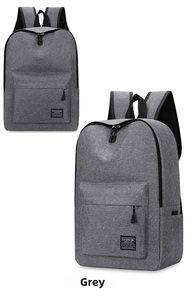 Detail view of grey heather fabric texture and front pocket on this durable backpack