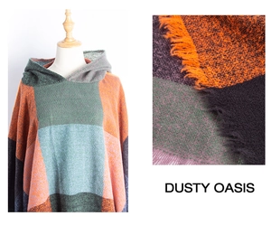 Detail of plaid hooded poncho with fringe trim showing soft knitted texture