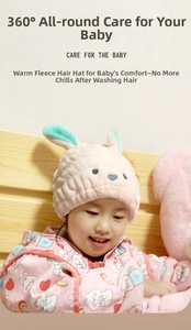 Pink rabbit ear dry hair cap made of thick coral fleece for quick water absorption