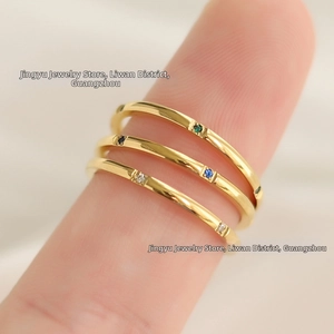 Three-piece stacking rings with colorful square gemstones in 18K gold-plated titanium
