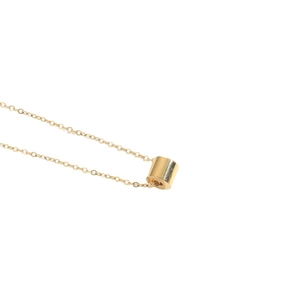 Minimalist gold necklace featuring a sleek cylindrical pendant on a delicate metal chain