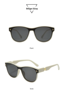 Detail view of oval sunglasses with cream white frame and gold metallic hinge accents