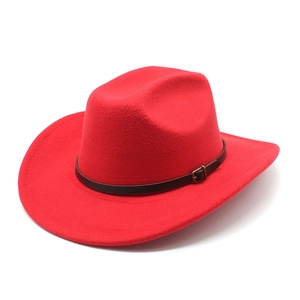 Detailed texture of red wool felt fedora featuring a brown leather belt with metal buckle