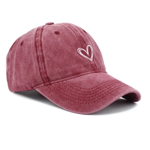 Close-up of heart embroidery detail on vintage washed cotton baseball cap