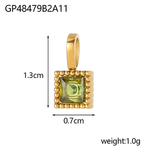 Macro view of square olive green stone pendant with golden granulation bead details