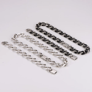 Close-up of black and silver ceramic拼接hip-hop link bracelets in a set