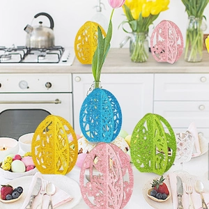 Detailed view of colorful glitter hollow Easter egg ornaments on a dining table decor