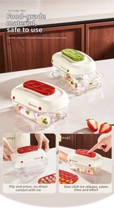 Macro detail of the press-to-release ice cube tray system with a large storage bin