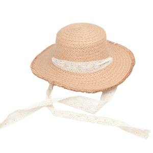 Detailed straw sun hat with raw edge brim and delicate white lace ribbon tie
