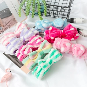 Soft coral fleece headband set with bow designs in various colorful patterns and stripes