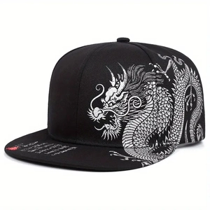 Black snapback baseball cap featuring intricate silver dragon embroidery on the side