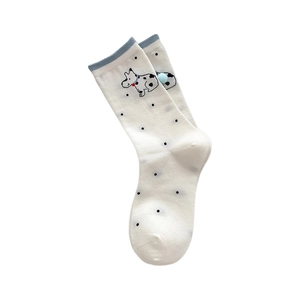 Polka dot crew socks in cream with blue cuff and cartoon dog featuring a blue pom-pom