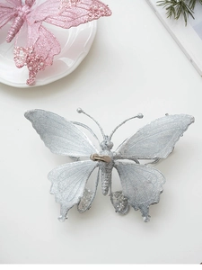 Glittering butterfly ornament with faux pearls for Christmas tree decoration in silver