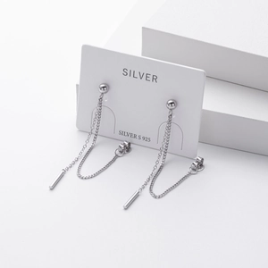 Macro view of S925 sterling silver tassel drop earrings with sparkling zircon accents