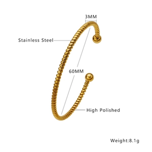 Polished 18k gold plated stainless steel twisted bangle bracelet with metal beads