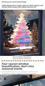 Close-up of pink Christmas tree window sticker with glowing lights and Merry Christmas text