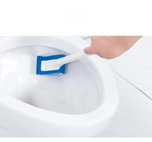 Long-handle toilet brush with dual-layer sponge cleaning the inner wall of white ceramic bowl