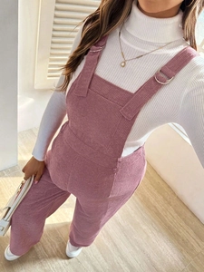 Pink corduroy maternity overalls for women with adjustable straps and elastic waist