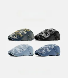 Detailed view of four denim beret colors featuring wave stitching and adjustable metal buckles