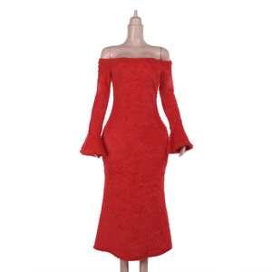 Detail of red long-sleeved dress with textured faux fur off-the-shoulder neckline on mannequin