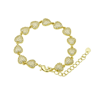 Macro view of gold heart bracelet with zircon pavé detail and adjustable lobster clasp