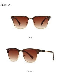 Detail view of tea gradient lenses and retro half-frame sunglasses with gold metal accents