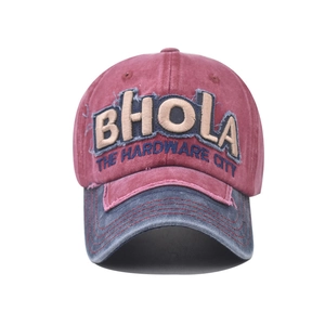 Close-up of BHOLA embroidery and distressed edges on this vintage mesh baseball cap
