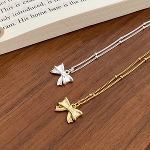 Minimalist s925 sterling silver bow necklace in gold and silver finish with bead chain