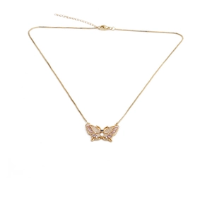 Detailed close-up of a gold butterfly necklace with pink and blue crystal zircon stones
