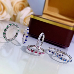 Detailed close-up of S925 silver eternity rings with colorful zircon inlay gemstones