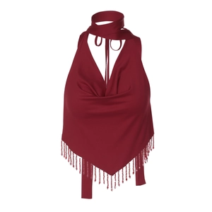 Detail of burgundy satin halter top featuring intricate beaded fringe tassels and silky texture