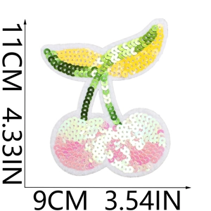 Detailed view of cherry sequin patch with dimensions 11cm height and 9cm width