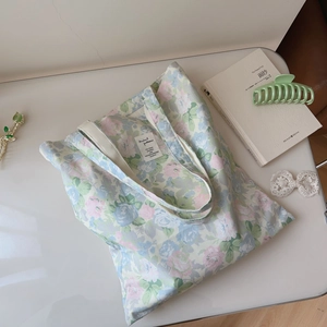 Floral print cotton canvas tote bag with green leaves and pink roses patterns