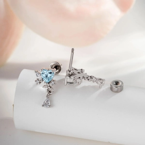 Exquisite heart-shaped blue zircon earrings with teardrop tassel and secure screw-back design